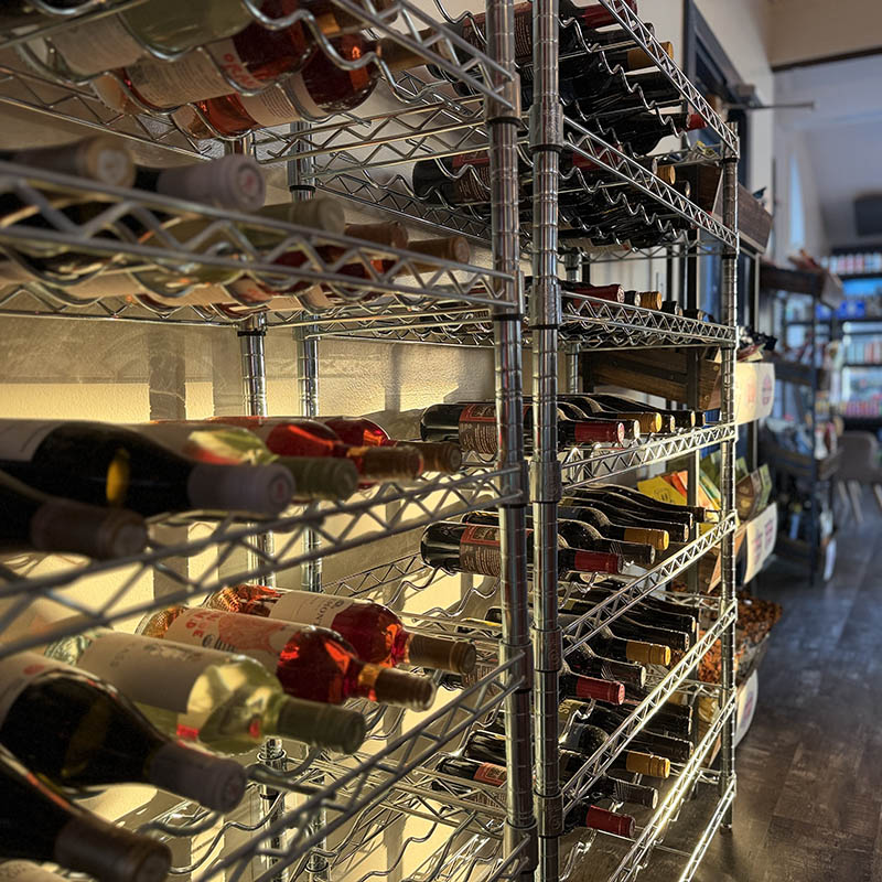 curated wine selection at Tugs - drink at the bar or take it to go